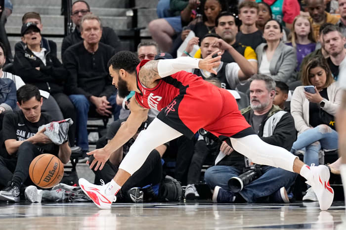 Rockets guard Fred VanVleet (5) reaches for a ball during the first half against the San Antonio Spurs at Frost Bank Center.